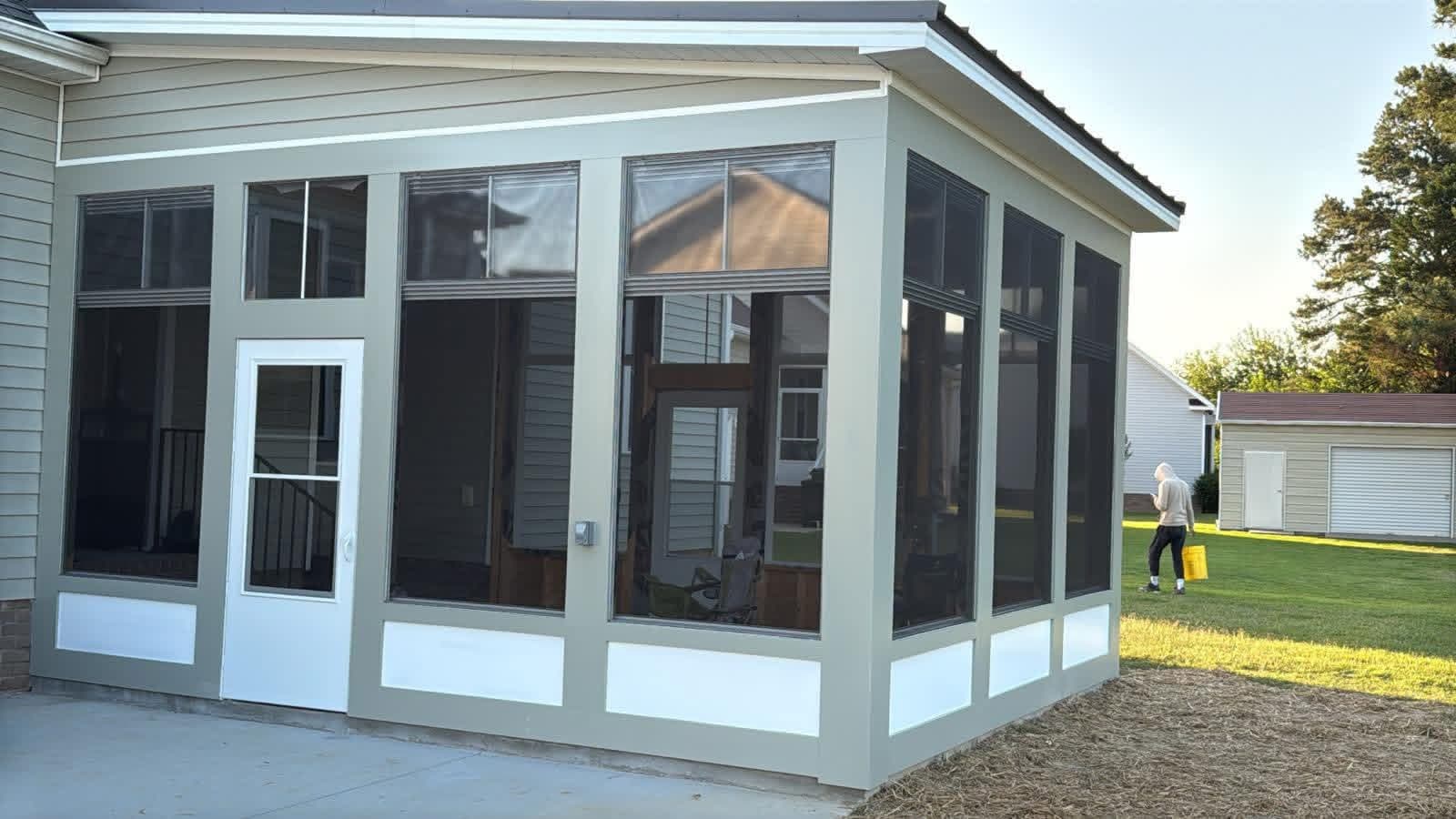 Screened porch side elevation with fresh exterior paint by Tacho Painting LLC in NC